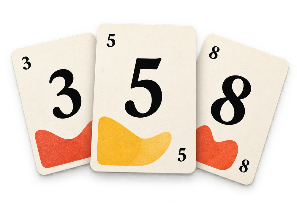 Three ivory planning poker cards showing 3, 5 and 8